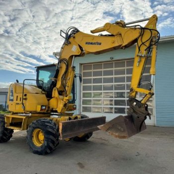 Pelle sur pneus KOMATSU PW118 - EUROCAMAT, spécialiste de la vente et du négoce de matériel travaux publics d’occasion